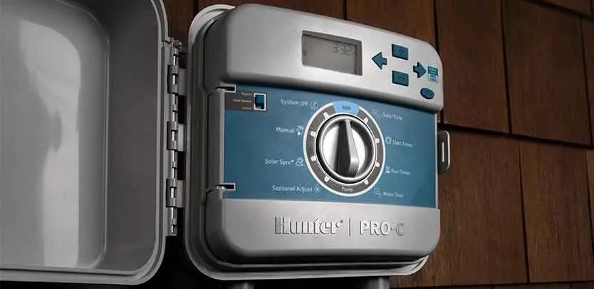 Wall-mounted irrigation controller with timer and seasonal-adjustment controls
